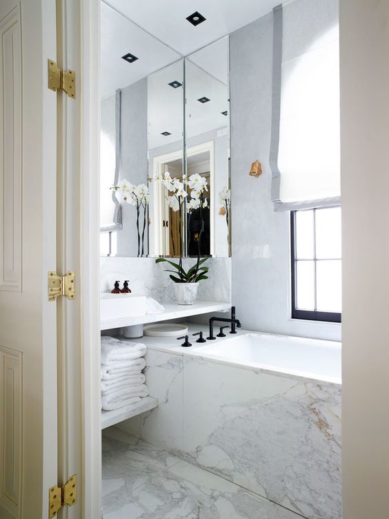 Soften Marble Bathrooms with White Orchids