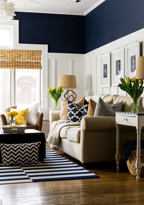Framed Nautical Prints Add Coastal Charm Above Wainscoting