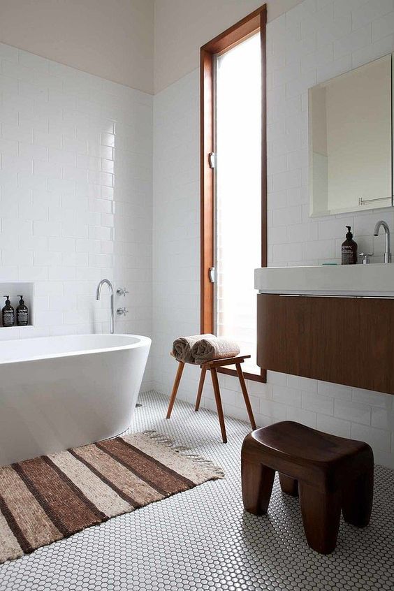 Wooden Stools Offer Convenient Towel Storage