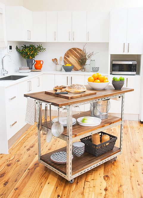 Industrial-Style Cart With Hanging Utensils and Towel