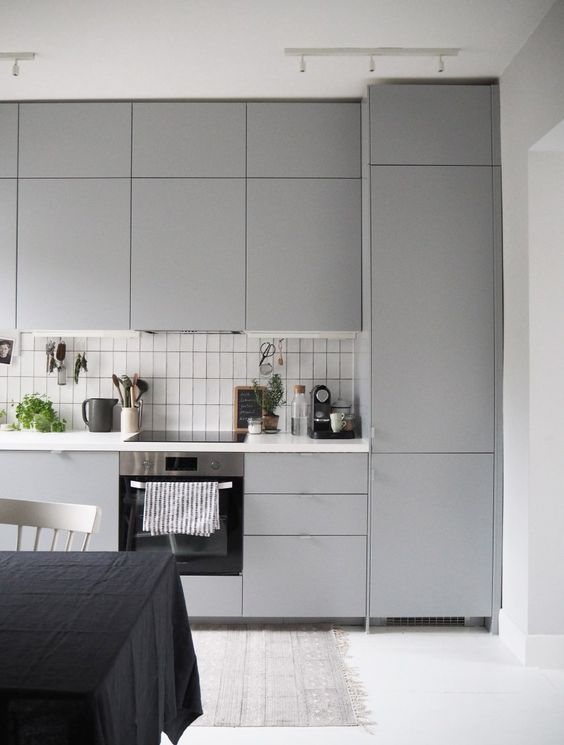 Open Shelving Displays Utensils and Greenery