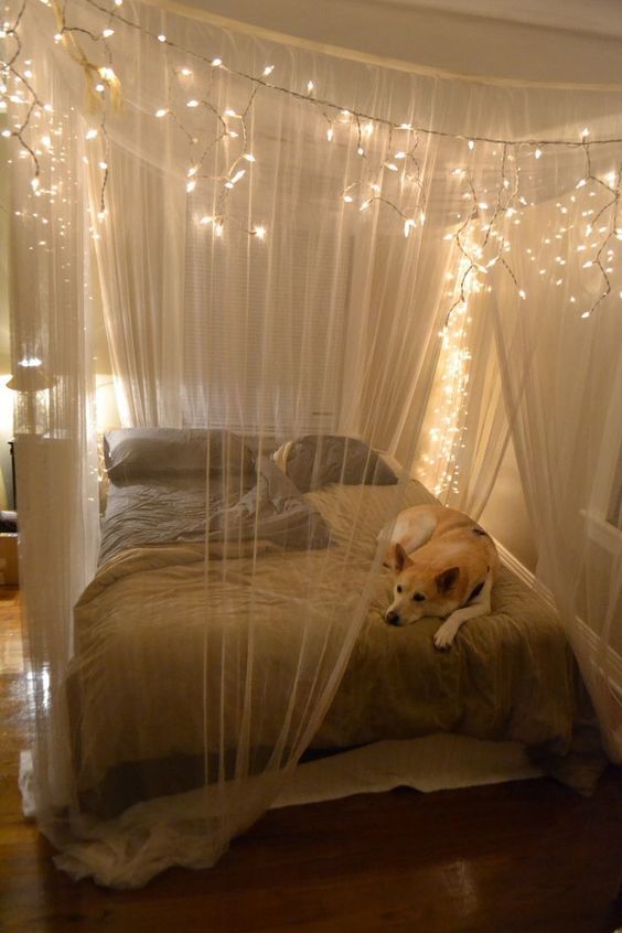 Drape Lights Across a Bed Canopy for a Magical Glow