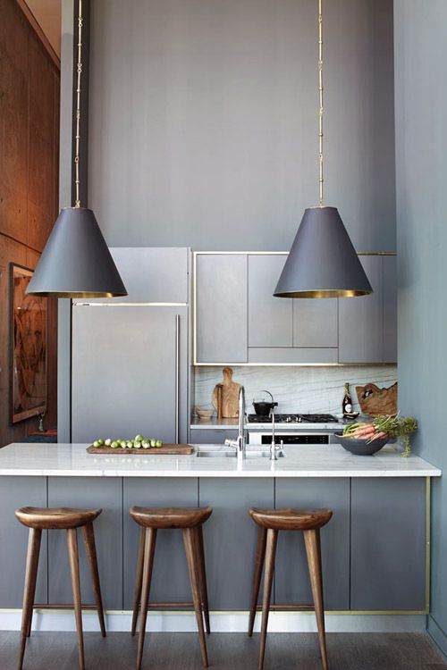 Conical Pendant Lights with Brass Accents Add Warmth