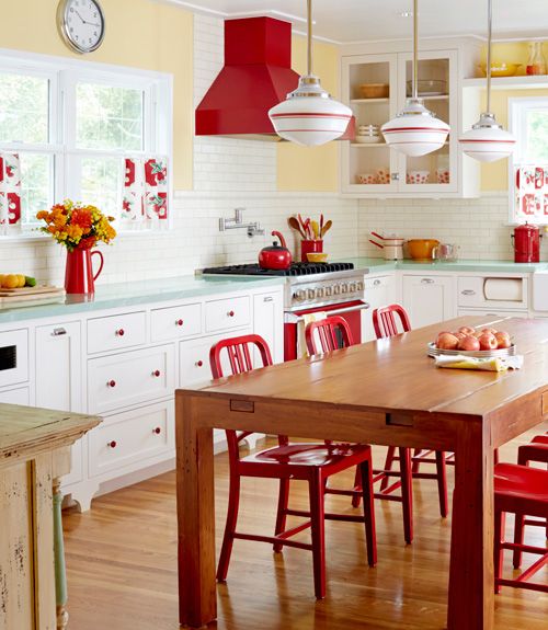 Red Metal Stools Add a Bold Pop to the Dining Area