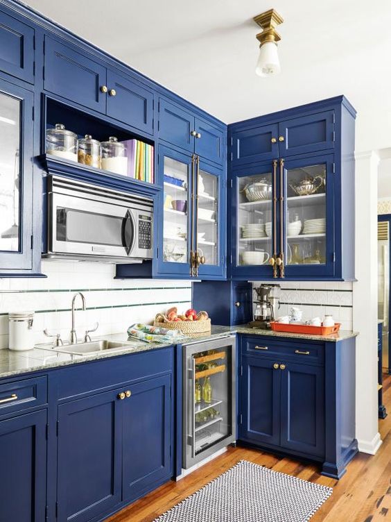 Glass-Front Cabinets Showcase White Dishware and Silverware