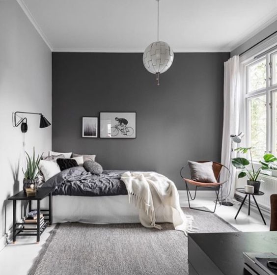 Framed Artwork Adds Graphic Interest Above the Bed