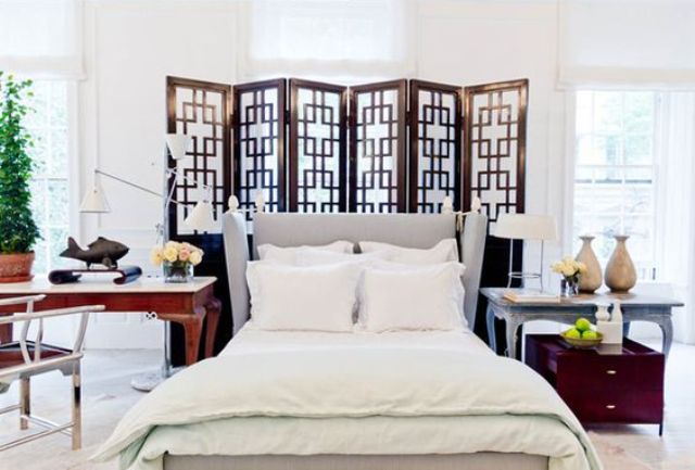 Folding Screen Behind Bed Adds Geometric Pattern