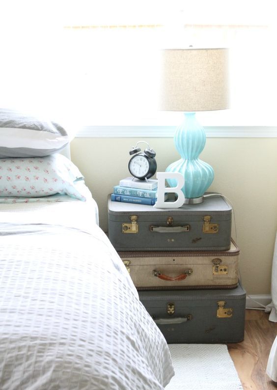 Stack Three Vintage Suitcases for a Tiered Bedside Table