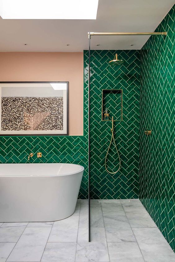 Emerald Herringbone Tile Walls Create a Jewel Box Effect