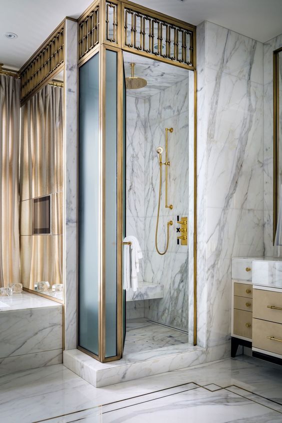 Brass Trim Around Marble Shower Adds Art Deco Flair