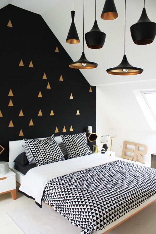 Gold Triangle Decals Add Whimsical Pattern to Black Walls
