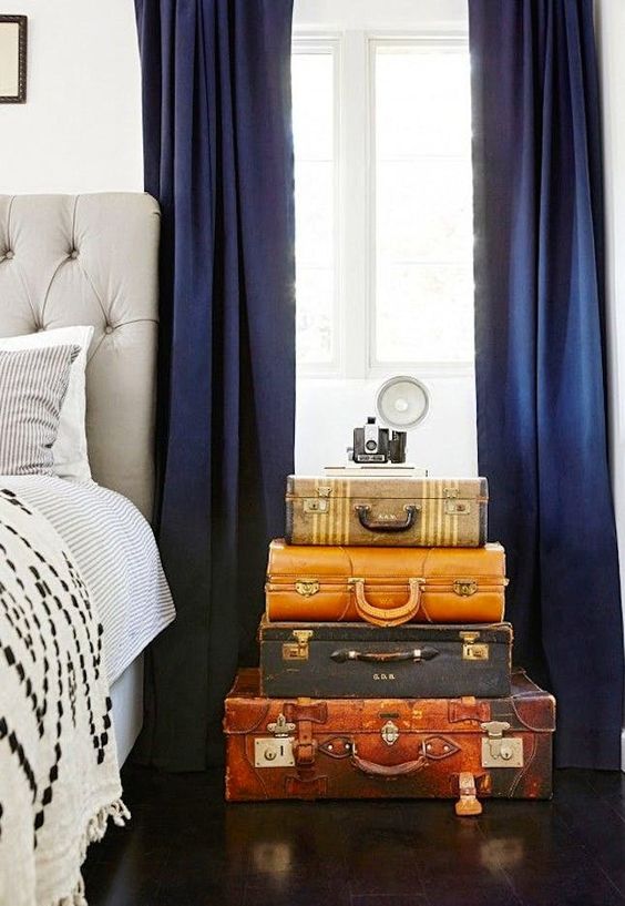 Stack Vintage Suitcases for a Rustic Nightstand