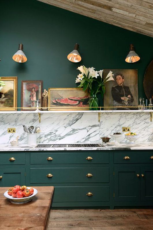 Artful Gallery Wall Above Marble Backsplash