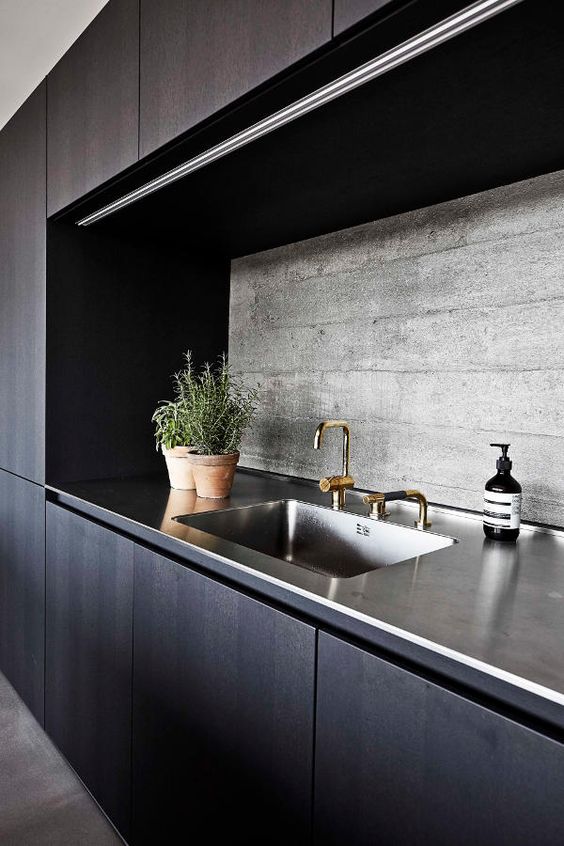 Soften Industrial Backsplash with Terracotta Pots