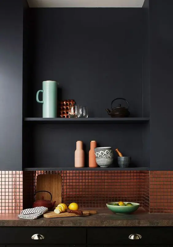 Small Copper Tiles Create a Shimmering Mosaic Backsplash