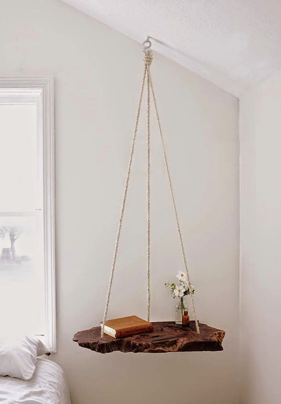 Live-Edge Wooden Shelf Hung by Rope for a Natural Touch
