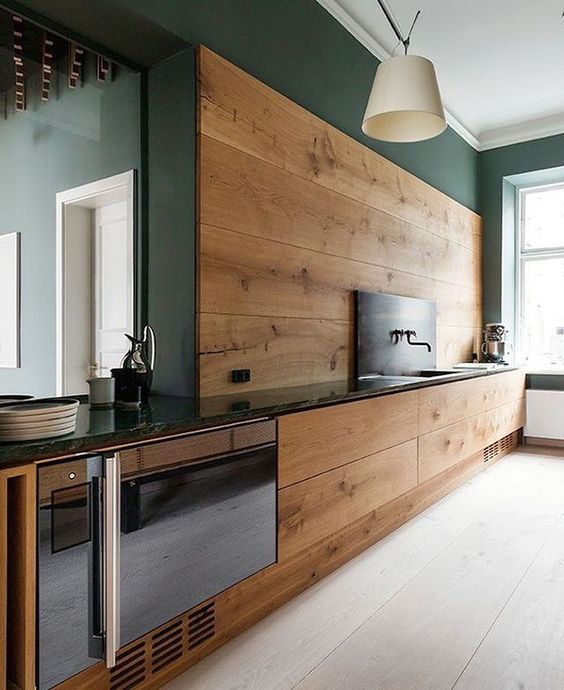 Full-Height Wood Paneling for an Enveloping Effect