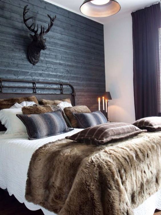 Rustic Wood Paneling Adds Natural Texture Behind the Bed