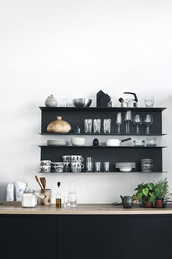 Black Shelving With Varied Dishware and Glassware