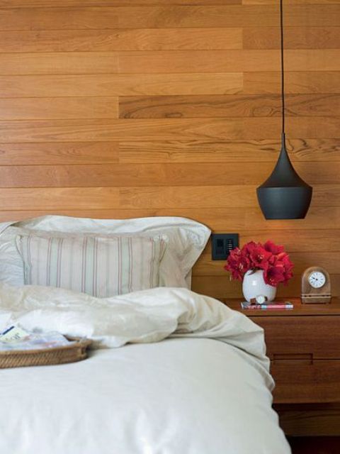Matte Black Bell Pendant Contrasts Warm Wood