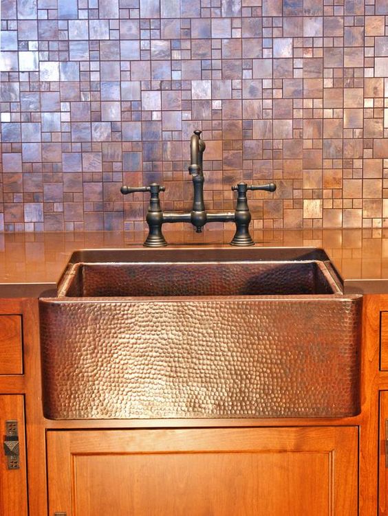Hammered Copper Farmhouse Sink Pairs With Mosaic Tile