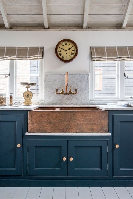 Warm Up Dark Cabinets with a Hammered Copper Farmhouse Sink