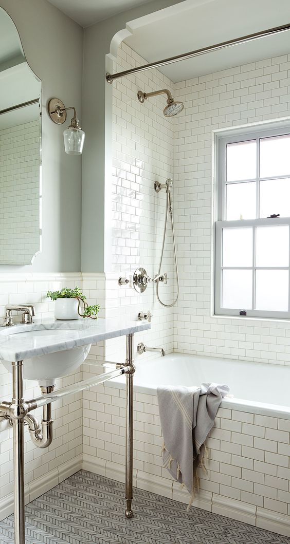 White Subway Tile Walls and Tub Surround Create a Clean Canvas