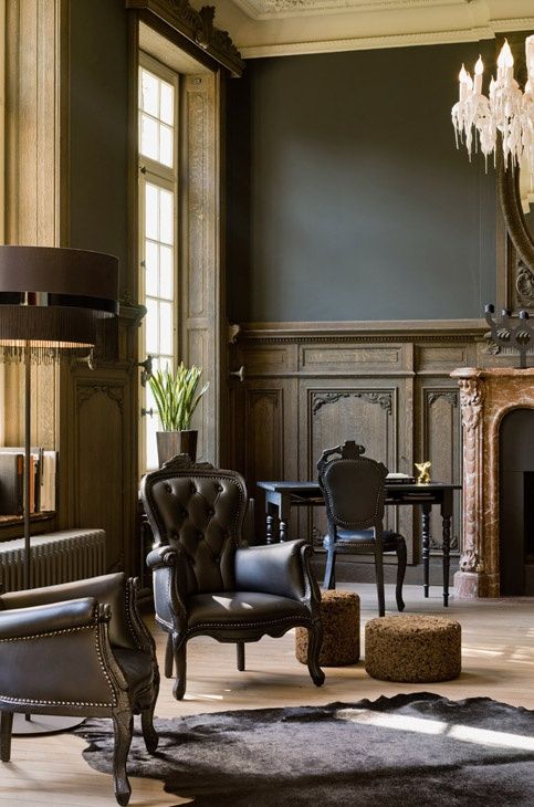 Dark Leather Chairs With Studded Details for a Vintage Vibe