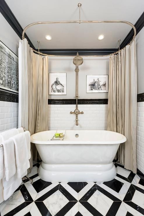 Striped Curtains Soften a Clawfoot Tub's Edges
