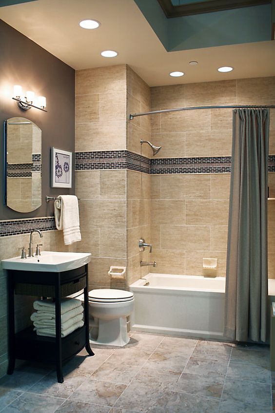 Narrow Black Tile Border Breaks Up Large Format Tiles