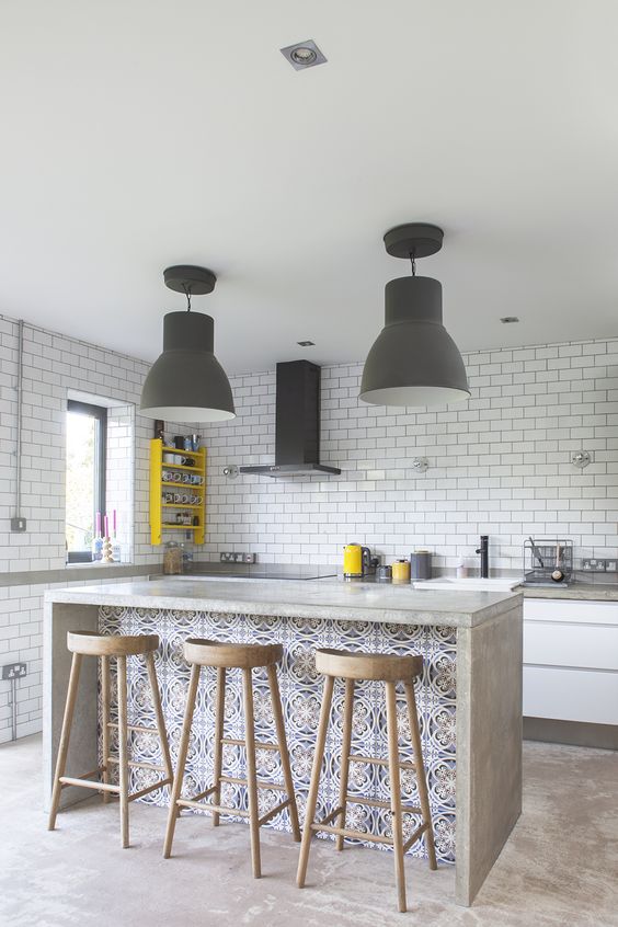 Patterned Tile Facade Adds Boldness to Island Seating