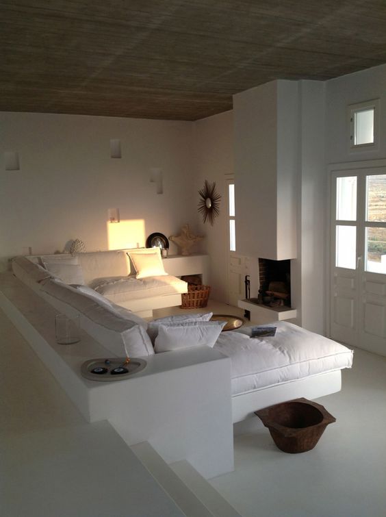 White Sectional With Integrated Ledge Creates a Cozy Nook