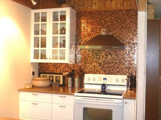 Penny Tile Backsplash Offers a Unique Metallic Finish