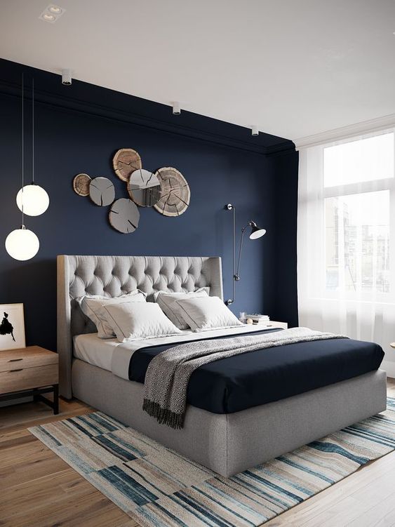 Wood Slice Art Adds Natural Texture Above the Bed