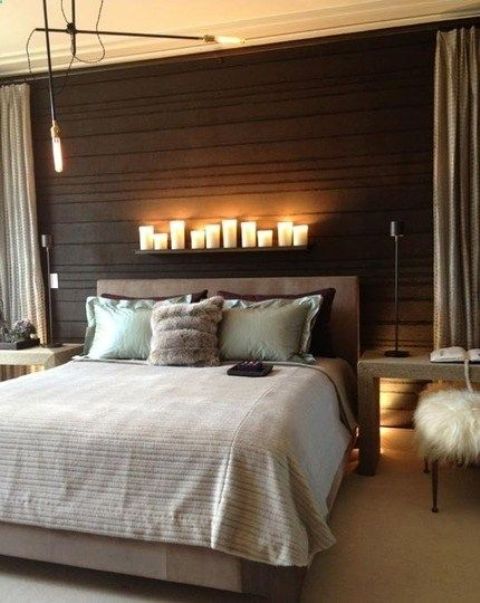 Candle Display Shelf Adds Warm Ambiance Above the Bed