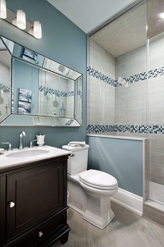 Blue and White Mosaic Tile Borders Add Subtle Pattern in Shower