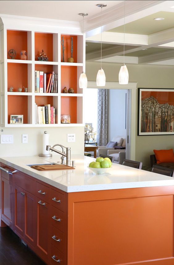 Orange Backed Shelves Add Depth To Display Niches