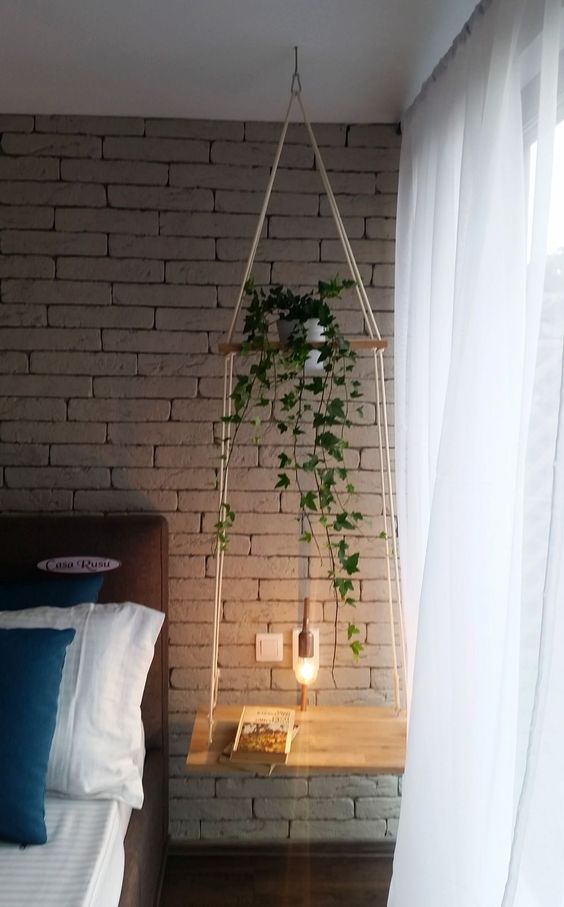Hanging Shelf With Integrated Lamp and Plant