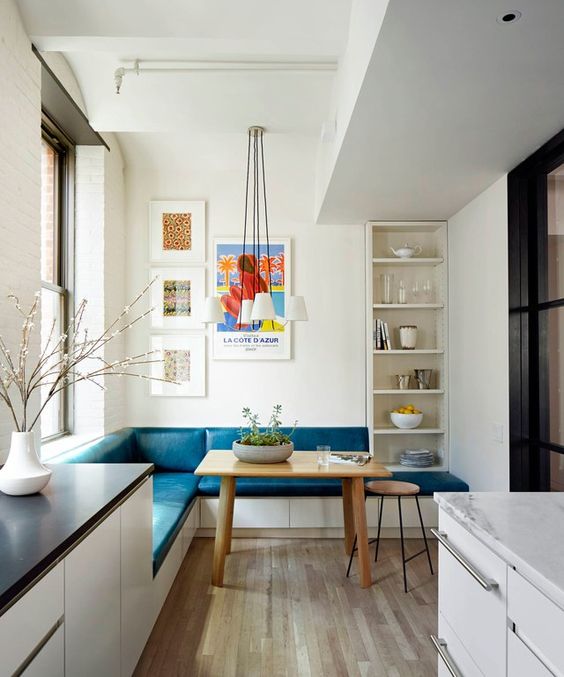 Bright Blue Upholstered Bench Creates a Cozy Dining Nook