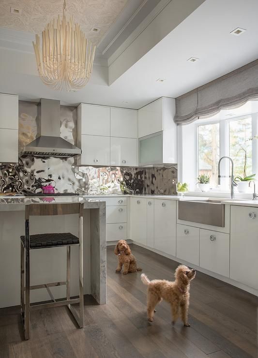 Textured Metal Backsplash Reflects Light and Adds Dimension