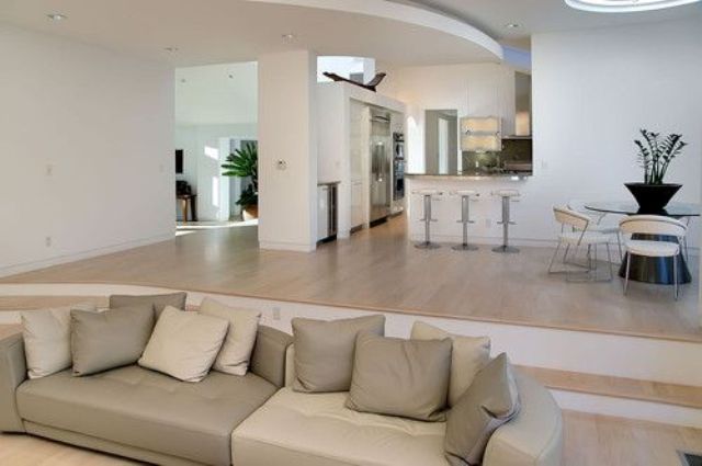 Curved Sofa With Contrasting Pillow Tones