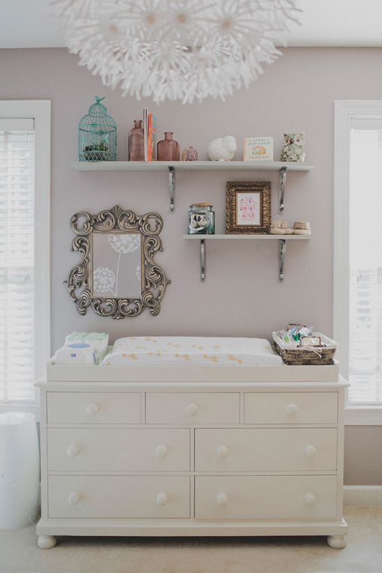 Ornate Mirror Adds Decorative Flair Above Changing Station