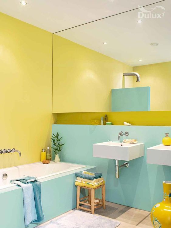 Open Shelves Create a Color Blocked Backdrop Behind Sinks
