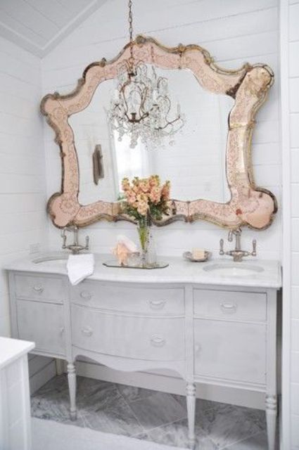 Soften a Double Vanity with a Pink-Toned Ornate Mirror