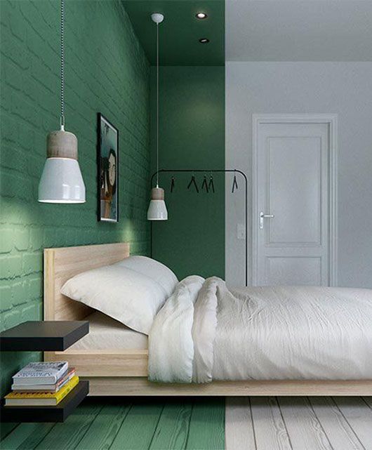 Deep Green Wall Paint Creates a Moody, Enclosed Zone
