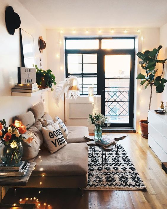 String Lights Draped Around a Large Window Frame