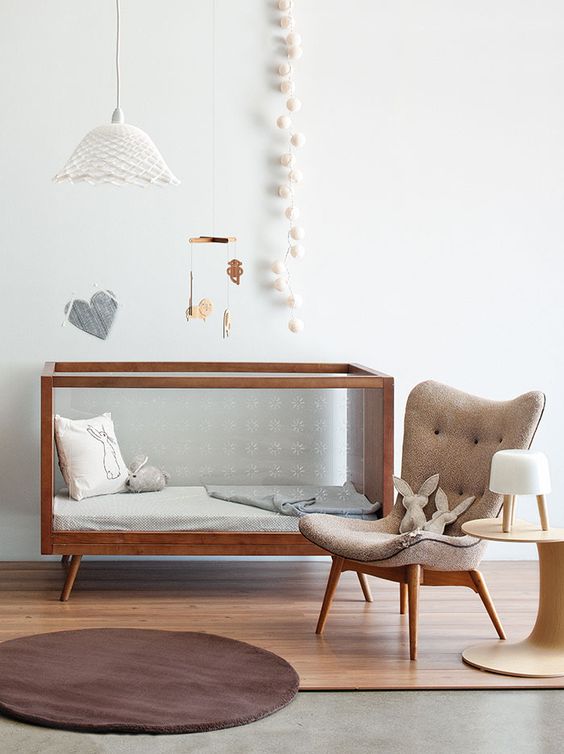 Wooden Crib with Clear Sides for Easy Viewing