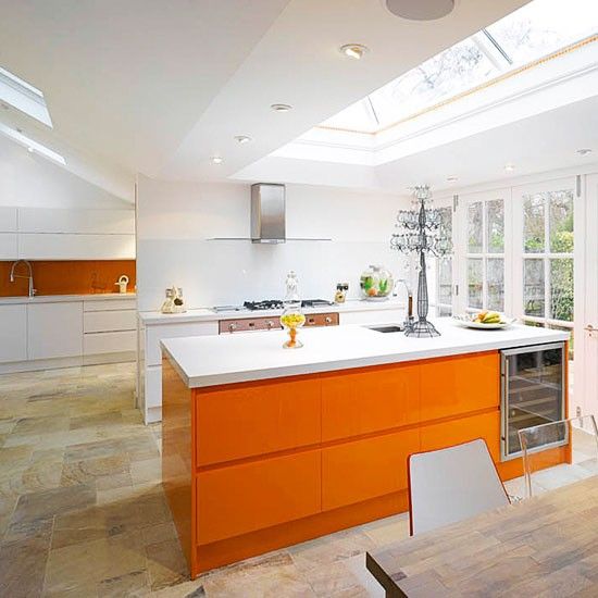 Glossy Orange Island Cabinets Add a Pop of Color