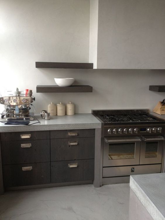 Contrast Light Countertops with Dark Wood Drawers