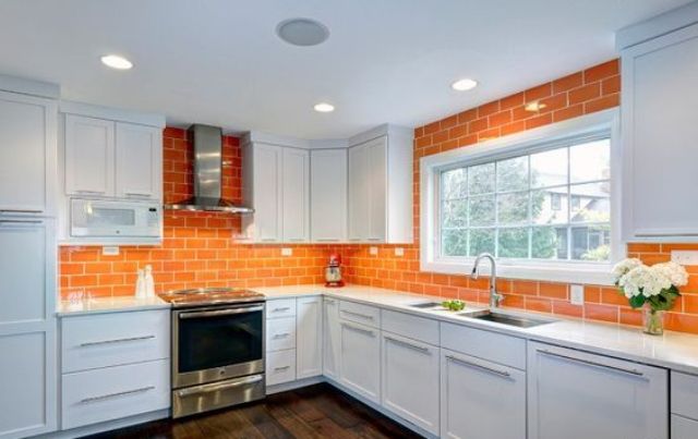 Orange Brick Tile Backsplash Adds Warmth and Texture